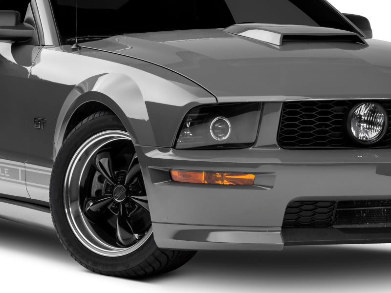 Phares halogènes à DEL de style 2010 de Raxiom 05-09 pour Ford Mustang - Noir Hsng (lentille transparente/à l'exclusion du GT500)