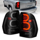 Feux arrière à LED ANZO 2002-2009 Chevrolet Trailblazer avec barre lumineuse, boîtier noir, lentille fumée