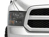 Raxiom 09-18 Dodge RAM 1500 Axial Series Euro Style Headlights w/ Dual Bulb Blk Housing (Clear Lens)