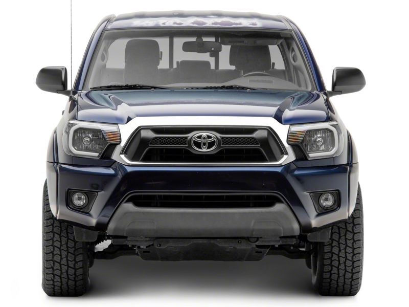 Phares Raxiom 12-15 Toyota Tacoma Axial Series avec barre LED - Boîtier noir (lentille transparente)