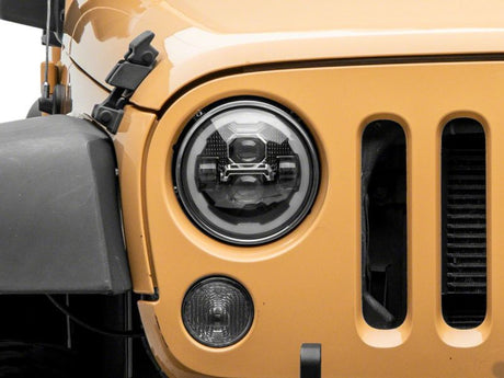 Phares à DEL Raxiom 07-18 Jeep Wrangler JK Axial 7 pouces avec clignotants DRL - Boîtier noir (transparent)