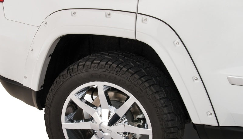 Bushwacker 11-18 Jeep Grand Cherokee Pocket Style Flares 4 pièces Ne convient pas au SRT8 - Noir