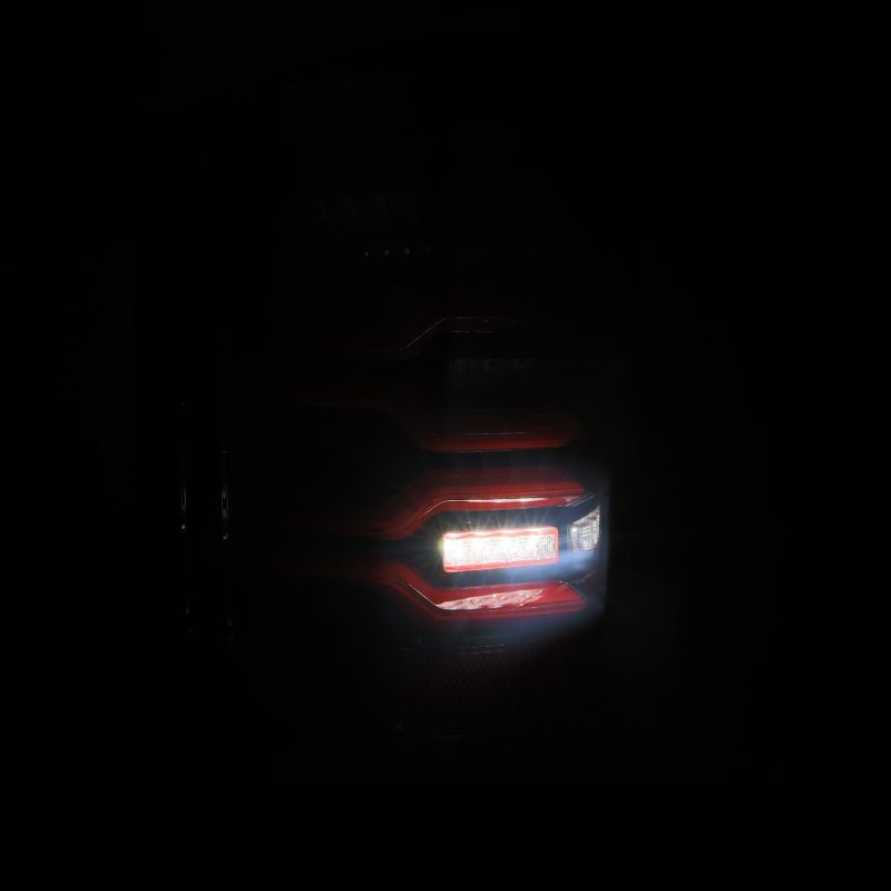 Feux arrière à LED AlphaRex 14-18 Chevy Silverado 1500 Luxx-Series noir/rouge avec Activ Light/Seq Signal
