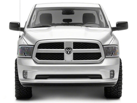 Raxiom 09-18 Dodge RAM 1500/2500/3500 Axial Headlights w/ SEQL LED Bar- Blk Housing (Clear Lens)