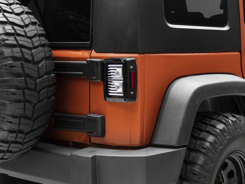 Feux arrière à LED Raxiom 07-18 Jeep Wrangler JK Axial Series Vision - Boîtier noir (lentille transparente)