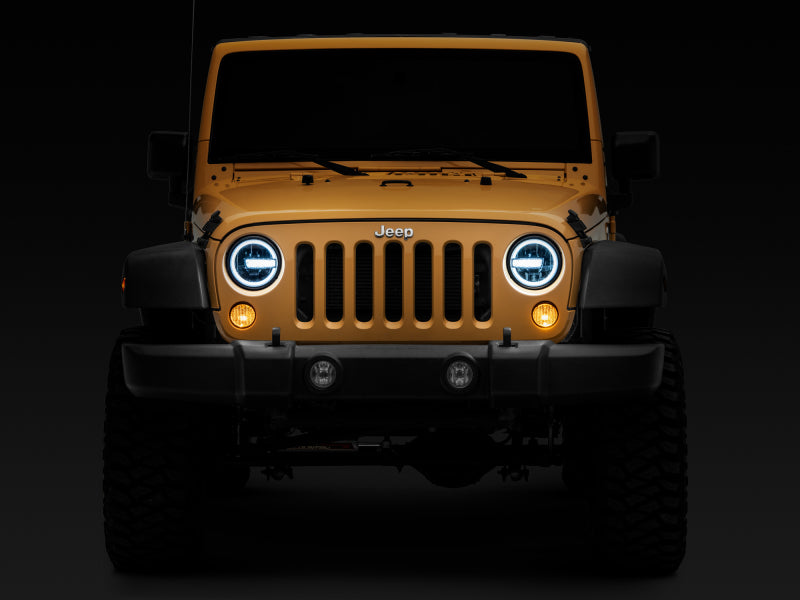 Phares à LED Raxiom 97-18 Jeep Wrangler TJ/JK 7 pouces avec halos - Boîtier noir (lentille transparente)