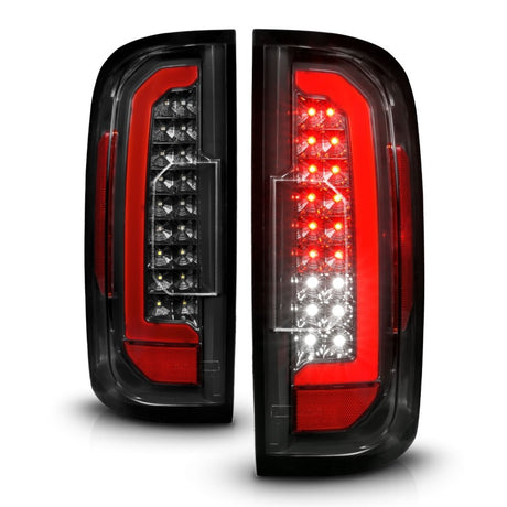 Feux arrière à LED ANZO 15-21 GMC Canyon avec barre lumineuse rouge, boîtier noir/lentille transparente
