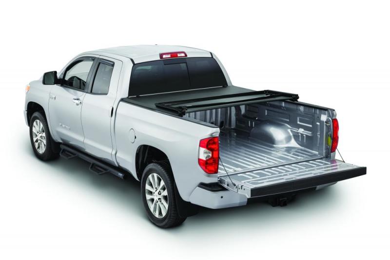 Tonno Pro 04-15 Nissan Titan 6,7 pieds (avec kit de chenilles utilitaires 42-498) Couvre-tonneau pliable en trois parties Tonno Fold