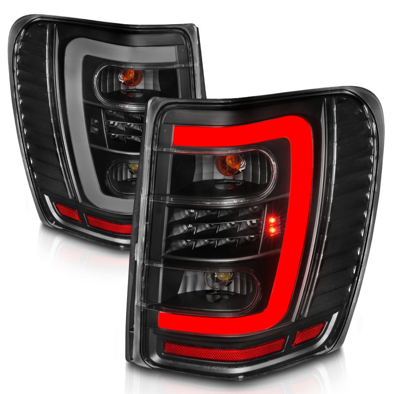 ANZO 1999-2004 Jeep Grand Cherokee LED Tail Lights w/ Light Bar Black Housing Clear Lens