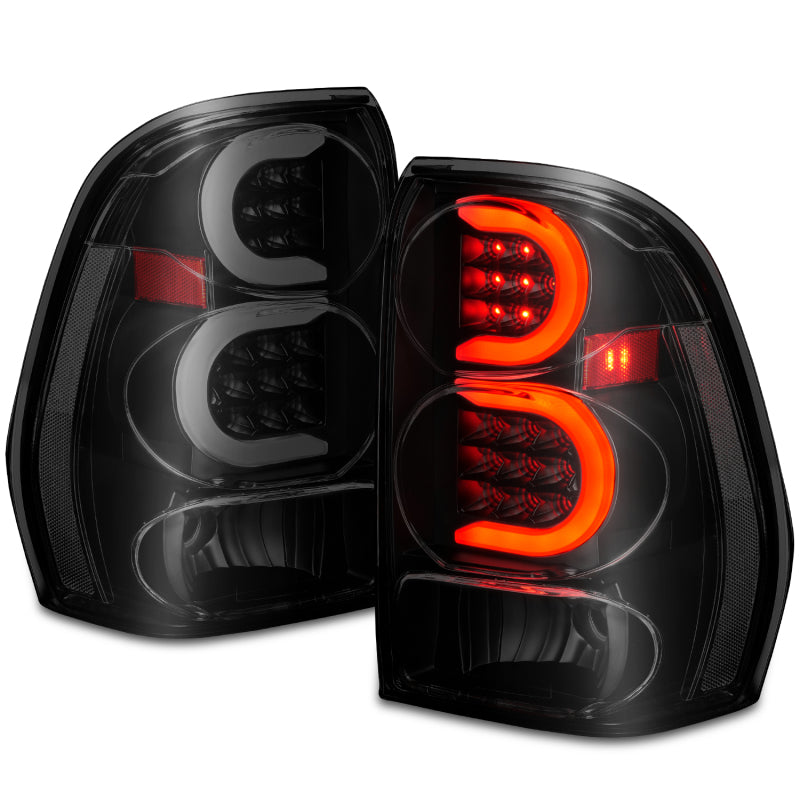 Feux arrière à LED ANZO 2002-2009 Chevrolet Trailblazer avec barre lumineuse, boîtier noir, lentille fumée