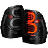 Feux arrière à LED ANZO 2002-2009 Chevrolet Trailblazer avec barre lumineuse, boîtier noir, lentille fumée