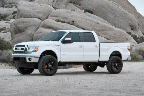 Système de performance Fabtech 09-13 Ford F150 4WD 4 pouces avec DLS 2.5 C/O Resi et DLS Rr