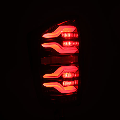 Feux arrière à LED AlphaRex 16-21 Toyota Tacoma LUXX Alpha Blk avec Activ Light/Seq Signal