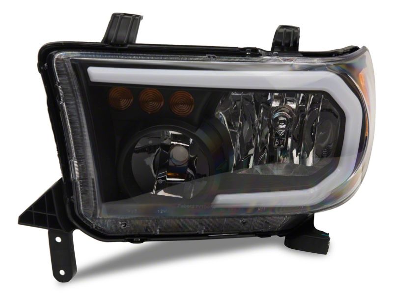 Raxiom 07-13 Toyota Tundra Axial Series Headlights w/ LED Bar- Blk Housing (Clear Lens)