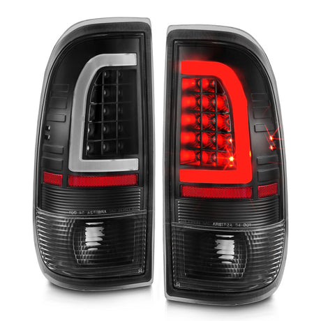Feux arrière à LED ANZO 1997-2003 Ford F-150 avec barre lumineuse, boîtier noir, lentille transparente