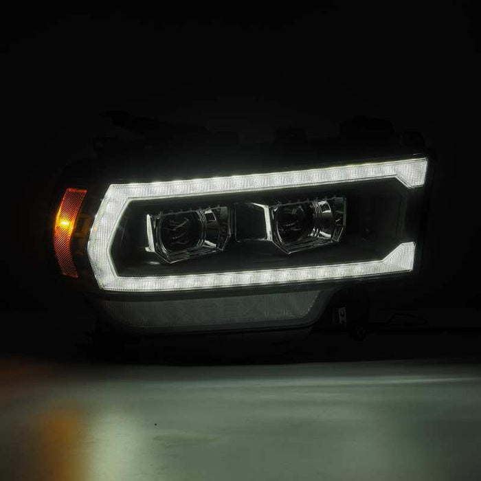 Phares à LED AlphaRex 19-21 Ram 2500 LUXX de style planche, noir avec éclairage actif/signal séquentiel/DRL