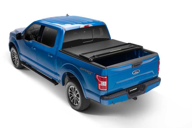 Lund 04-08 Ford F-150 Styleside (5.5ft. Bed) Hard Fold Tonneau Cover - Black