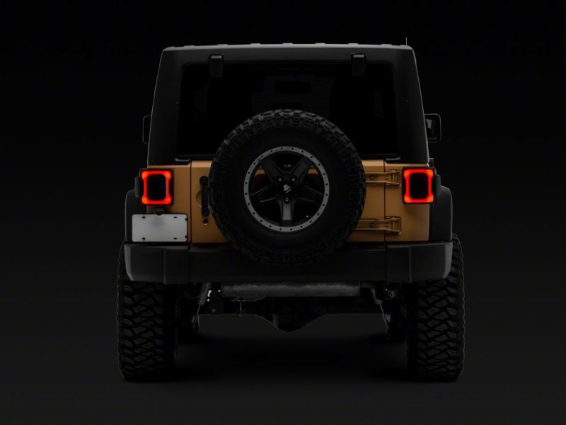 Feux arrière à LED Raxiom 07-18 Jeep Wrangler JK Axial Series Carver - Boîtier noir (lentille fumée)