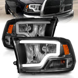 Phares en cristal ANZO 2009-2018 Dodge Ram 1500 avec barre lumineuse et boîtier noir