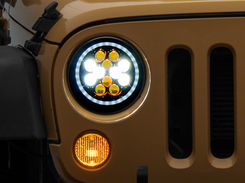 Phares à LED Raxiom 07-18 Jeep Wrangler JK Axial Spider avec halo Angel Eye - Boîtier noir (lentille transparente)